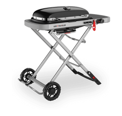 The Weber Traveller BBQ portable charcoal grill, compact design for easy travel – available at Keans Claremorris.