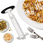 Oxo Pineapple Cutter Ratchet with ergonomic handle for easy slicing – available at Keans Claremorris.